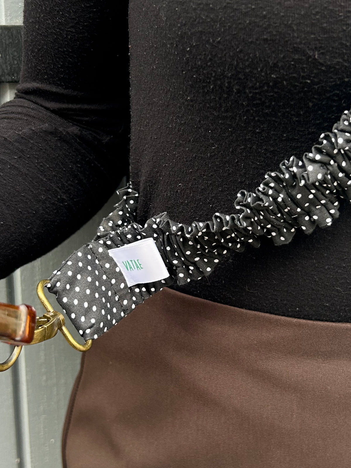 Bandoulière téléphone noire à pois