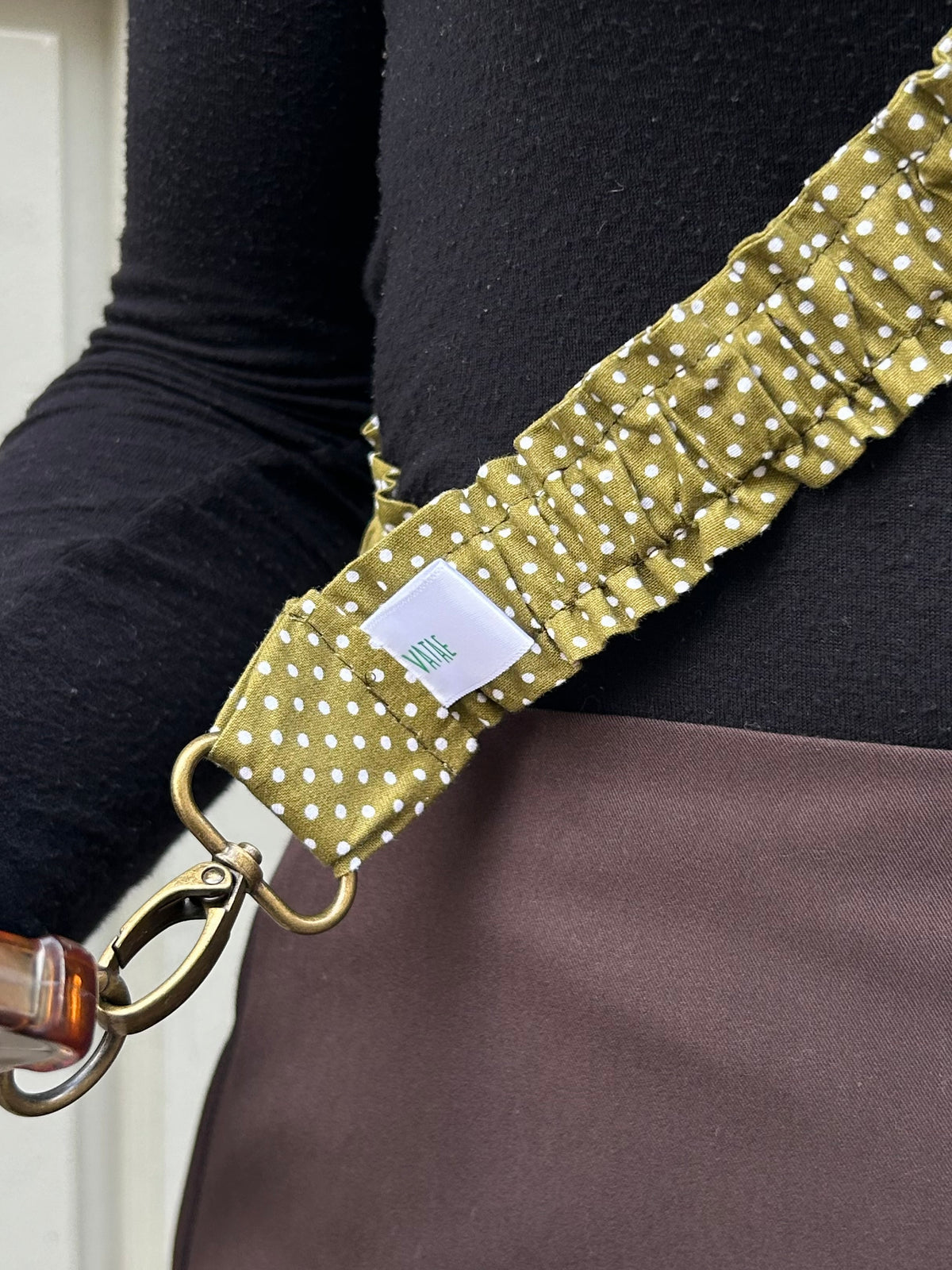 Bandoulière téléphone kaki à pois